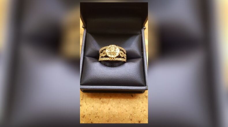 A Cobb County woman was robbed when she tried to sell her son's wedding ring to someone she met online.