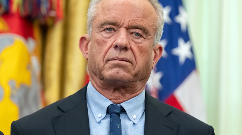 Health and Human Services Secretary Robert F. Kennedy Jr. attends an event on health care affordability in the Oval Office at the White House, Thursday, April 23, 2026, in Washington. (AP Photo/Mark Schiefelbein)