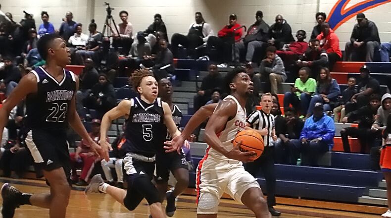 Columbia’s Devin Longstreet drives to complete a fast break.