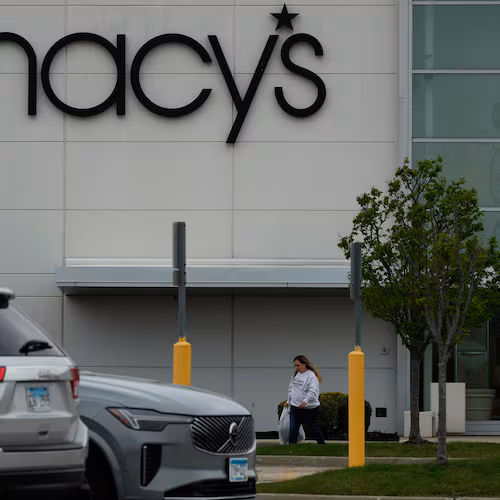 FILE - A Macy's sign is displayed outside the department store in Gurnee, Ill., Wednesday, April 15, 2026. (AP Photo/Nam Y. Huh, file)