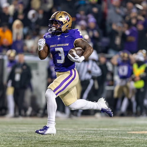 James Madison running back Wayne Knight (3) runs the ball for a touchdown against Troy during the first half of the Sun Belt Championship NCAA college football game, Friday, Dec. 5, 2025, in Harrisonburg, Va. (AP Photo/Robert Simmons)