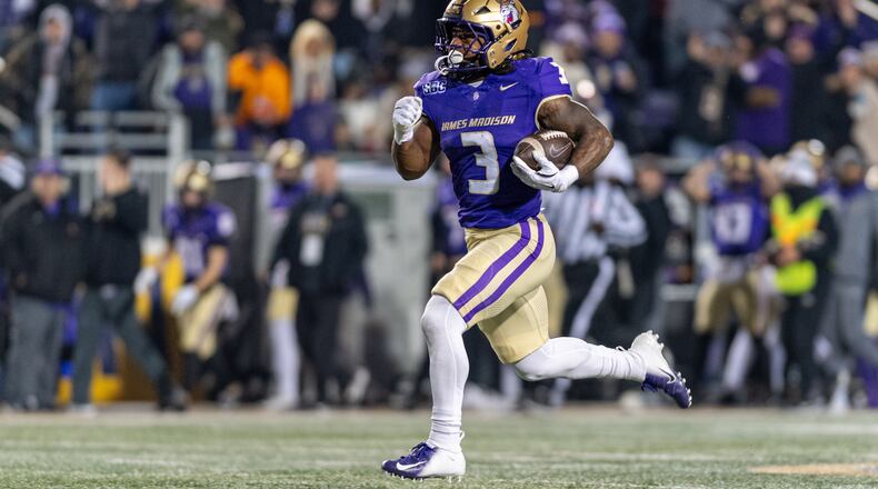 James Madison running back Wayne Knight (3) runs the ball for a touchdown against Troy during the first half of the Sun Belt Championship NCAA college football game, Friday, Dec. 5, 2025, in Harrisonburg, Va. (AP Photo/Robert Simmons)