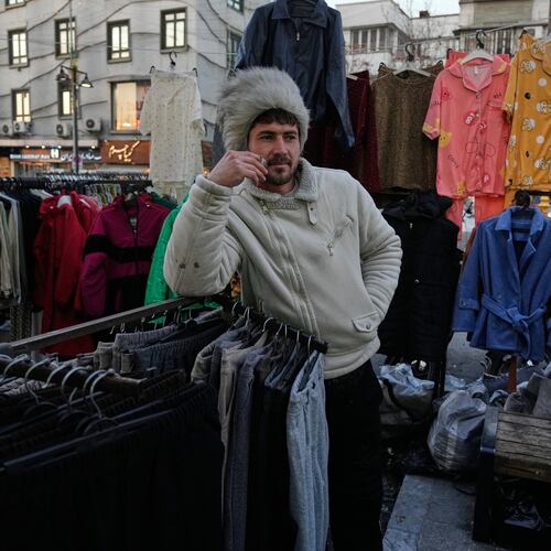 A vendor waits for customers at Tajrish Square in Tehran, Iran, Tuesday, Jan. 27, 2026. (AP Photo/Vahid Salemi)