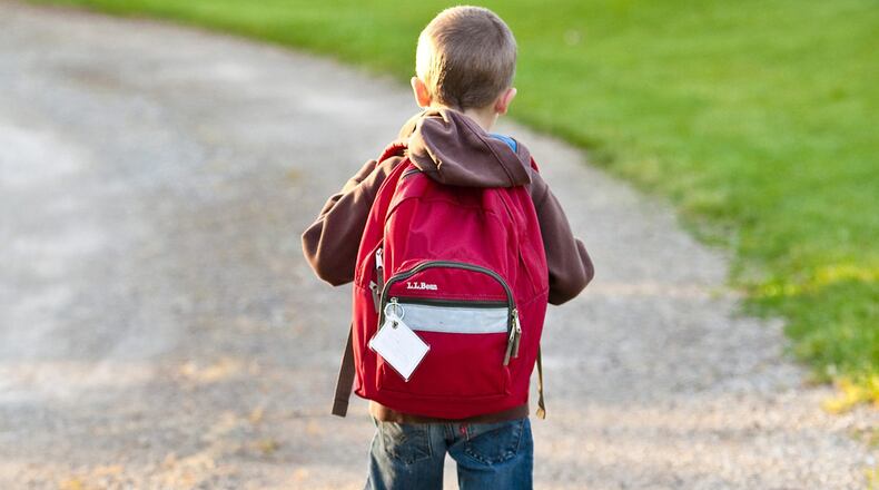 FILE PHOTO: A little boy with autism was having a rough day on the first day of school so a classmate helped him get over his fears.