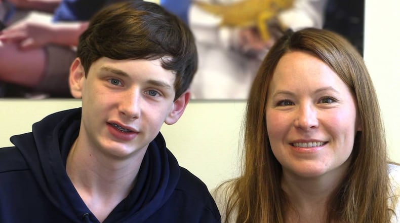 Collin Etheridge, left, and his mother Meghann Etheridge (Photo Courtesy of Mike Haskey)