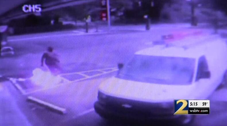 This is a surveillance photo of a man who was severely burned when he caught fire pumping gas at an Atlanta station, fire officials said.