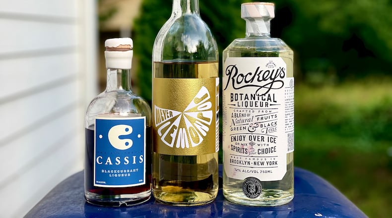 C Cassis, Meyer Lemonpop and Rockey’s Botanical Liqueur have a lot of flavor, but not the punch of a higher proof product. Krista Slater for The Atlanta Journal-Constitution