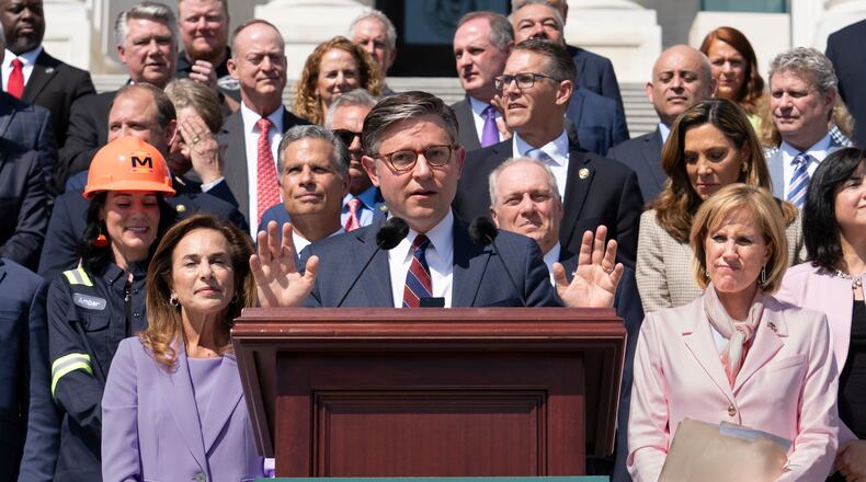 Speaker of the House Mike Johnson, R-La., and fellow Republicans celebrate GOP tax policies at an event outside the Capitol in Washington, Wednesday, April 15, 2026. (AP Photo/J. Scott Applewhite)