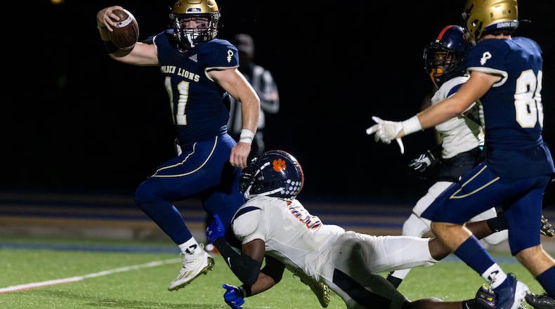 St. Pius’ Shug Bentley scores a touchdown during a GHSA High School football game between St. Pius and Mundy’s Mill at St. Pius Catholic School in Atlanta, GA, on Friday, November 11, 2022.(Photo/Jenn Finch)
