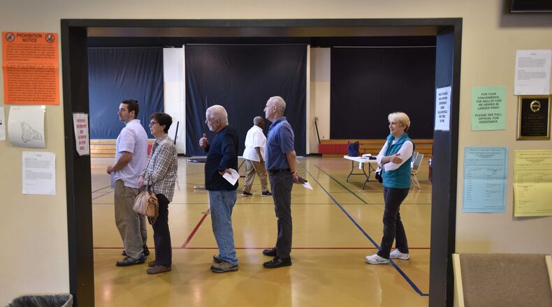Tucker residents lined up to voter to elect their first city government leaders at The Ministry Center of First Baptist Church of Tucker on March 1. Tucker and existing cities may soon seek to expand. HYOSUB SHIN / HSHIN@AJC.COM