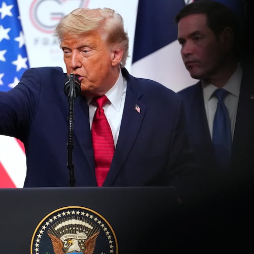 U.S. President Donald Trump, center, takes questions during a media conference at the end of the G7 summit in Evian-les-Bains, France, Wednesday, June 17, 2026. (AP Photo/Vadim Ghirda)