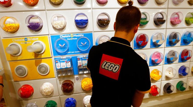 German police are looking for witnesses after burglars broke through the wall of a toy store to steal dozens of Lego sets.
