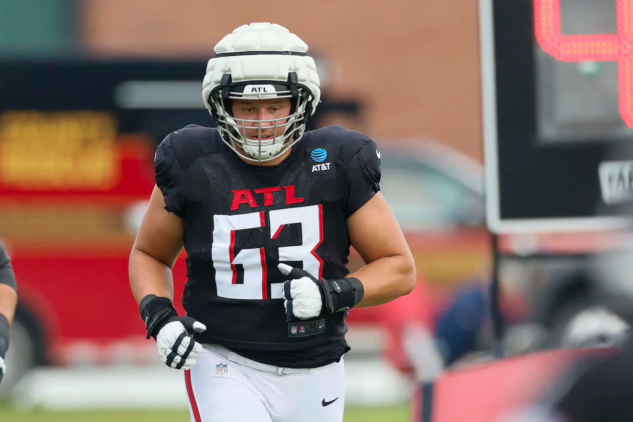 Falcons guard and eight-year veteran Chris Lindstrom, shown here during a joint practice with the Titans in August, says he felt like a rookie under new offensive line coach Bill Callahan. “I definitely felt like a baby deer for a minute there,” Lindstrom said last month. (Miguel Martinez/AJC 2025)