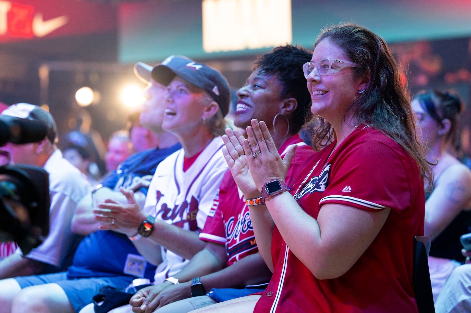 Kathy London (from left), Kahlila Alexander, and Lacie Bean cheer during the 2025 MLB Draft Sunday, July 13, 2025 at the Coca-Cola Roxy in Atlanta. (Daniel Varnado/For the Atlanta Journal-Constitution)