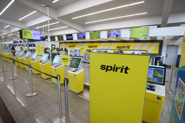 The Spirit Airlines departure check-in area is shown vacant at the Domestic Terminal North at Hartsfield-Jackson Atlanta International Airport, Tuesday, May 5, 2026, in Atlanta. Spirit Airlines ceased all operations and announced on Saturday, May 2nd, that it has gone out of business after 34 years. (Jason Getz/AJC)