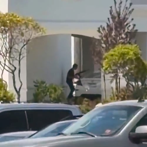 This still image captured from video by a witness shows the scene of a shooting that started at an In-N-Out Burger restaurant, Saturday, Aug. 1, 2026 in Twin Falls, Idaho. (Kevin Bell Jr. via AP)