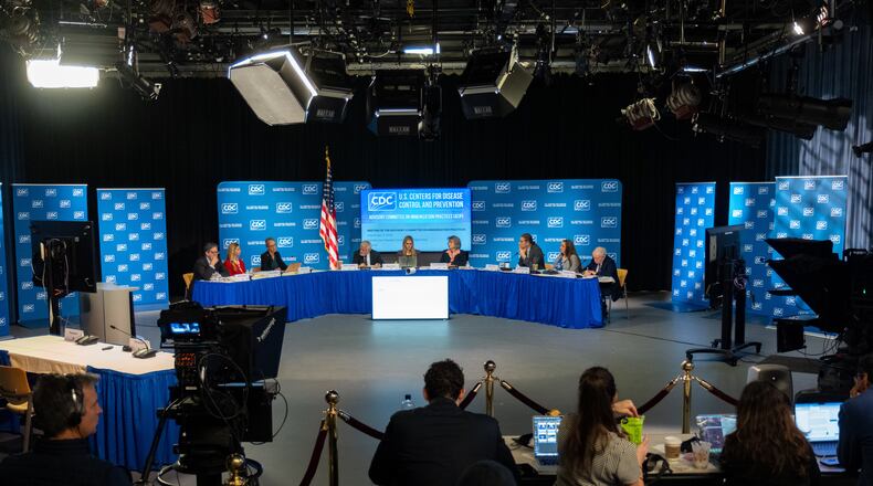 The CDC Advisory Committee on Immunization Practices meets in Atlanta on Friday, Dec. 5, 2025 to consider changes in hepatitis B vaccine recommendations for infants. (AP Photo/Ben Gray)