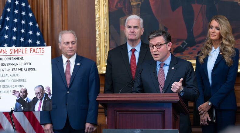 Speaker of the House Mike Johnson, R-La., faces reporters, joined from left by Majority Leader Steve Scalise, R-La. (left), Majority Whip Tom Emmer, R-Minn. (center), and Small Business Administration head Kelly Loeffler (right) at a news conference on day 27 of the government shutdown, at the Capitol in Washington, Monday, Oct. 27, 2025. (J. Scott Applewhite/AP)