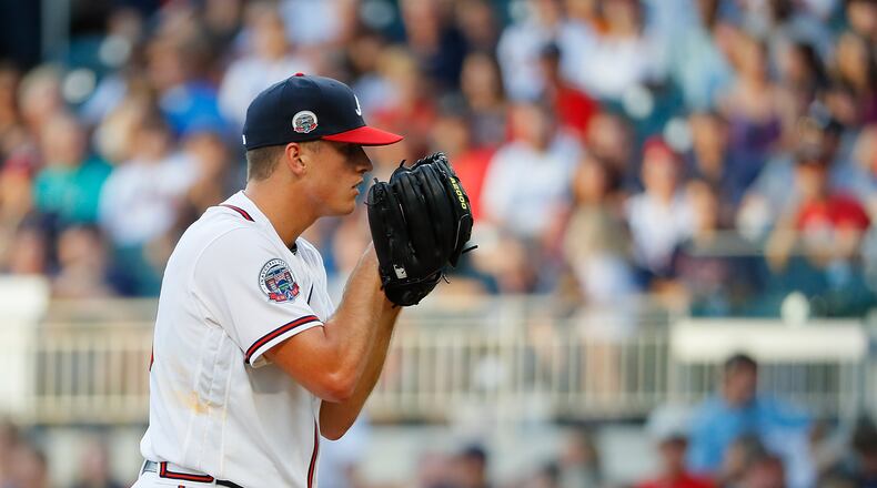 Lucas Sims of the Atlanta Braves makes his MLB debut as he pitches in the first inning against the Los Angeles Dodgers at SunTrust Park on August 1, 2017 in Atlanta, Georgia.