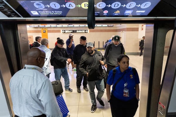 Travelers get on the Plane Train at Hartsfield-Jackson Atlanta International Airport in Atlanta on Wednesday, June 4, 2025. (Arvin Temkar/AJC)