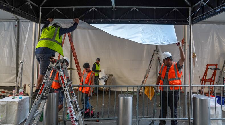 Workers set up a tent outside of Madison Square Garden ahead of a reported wedding between singer Taylor Swift and National Football League player Travis Kelce on Thursday, July 2, 2026, in New York. (AP Photo/Ryan Murphy)