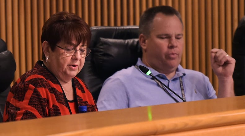 Gwinnett’s Board of Commissioners Chair Charlotte Nash, left, announces the approval of a new contract with MARTA on Wednesday, August 1 at the Gwinnett Justice and Administration Center auditorium. Commissioner Tommy Hunter, District 3, is right. JENNA EASON / JENNA.EASON@COXINC.COM