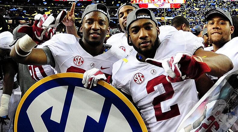 DECEMBER 06: DeAndrew White #2 of the Alabama Crimson Tide celebrates with teammates after their 42 to 13 win over the Missouri Tigers in the SEC Championship game at the Georgia Dome on December 6, 2014 in Atlanta, Georgia. (Photo by Scott Cunningham/Getty Images)
