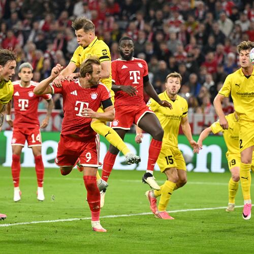 Bayern's Harry Kane, third from left bottom, scores his side's second goal during the Champions League opening phase soccer match between Bayern Munich and Bodo Glimt in Munich, Germany, Thursday, Sept. 10, 2026. (AP Photo/Lennart Preiss)