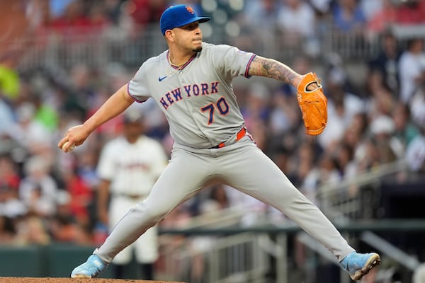 New York Mets pitcher José Buttó (70) works in the fourth inning of a baseball game against the Atlanta Braves, Wednesday, June 18, 2025, in Atlanta. (AP Photo/Mike Stewart)