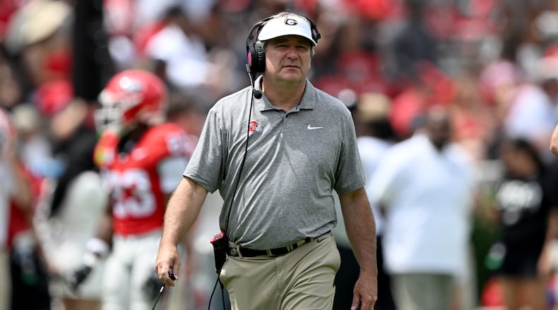 Georgia head coach Kirby Smart watches the action during the G-Day spring football game at Sanford Stadium on Saturday, April 18, 2026, in Athens. Smart cited the fleeting interest in non-playoff bowl games last fall. (Hyosub Shin/AJC)