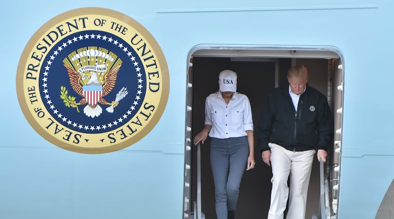 President Donald Trump and First Lady Melania Trump arrive at Robins Air Force Base to survey the damage left by Hurricane Michael.