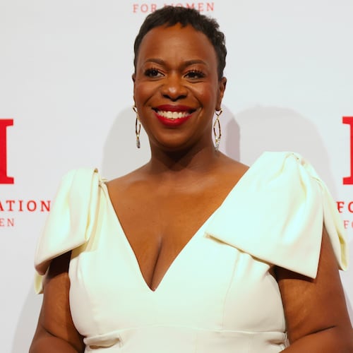 Tracy Sturdivant, center, poses for photos on the red carpet before the Ms. Foundation's Women of Vision Awards Gala, Tuesday, April 28, 2026, in New York. (AP Photo/Heather Khalifa)