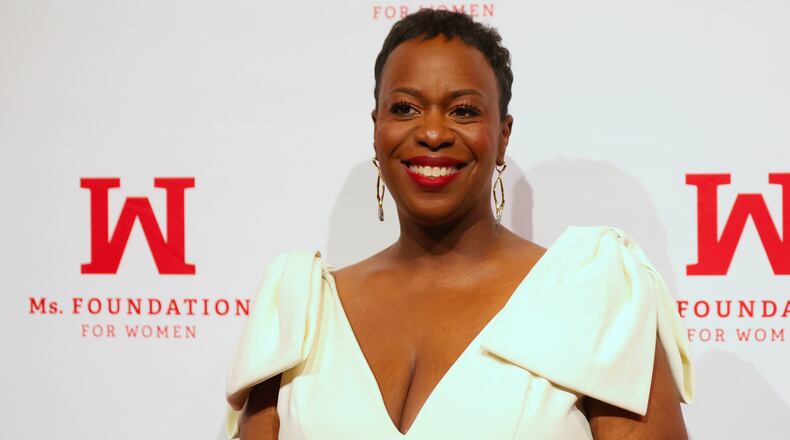 Tracy Sturdivant, center, poses for photos on the red carpet before the Ms. Foundation's Women of Vision Awards Gala, Tuesday, April 28, 2026, in New York. (AP Photo/Heather Khalifa)