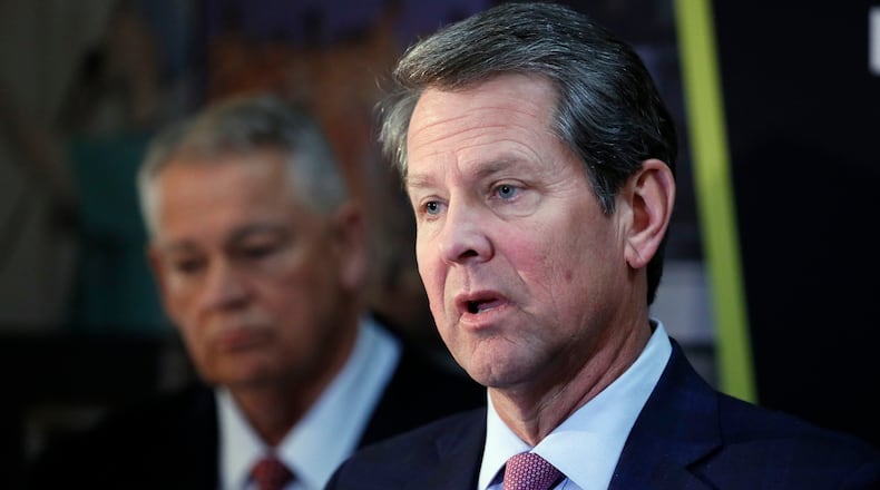 Gov. Brian Kemp (right) and House Speaker David Ralston at a press conference after the passage of SB 106, a measure that could allow the governor to expand Medicaid in Georgia. Bob Andres, bandres@ajc.com