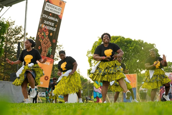 Dancers perform at a park near George Floyd Square on the five-year anniversary of Floyd's death, Sunday, May 25, 2025, in Minneapolis. (AP Photo/Abbie Parr)
