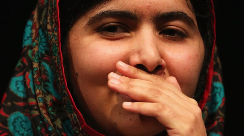 Malala Yousafzai looks on during a press conference at the Library of Birmingham after being announced as a recipient of the Nobel Peace Prize, on October 10, 2014 in Birmingham, England.