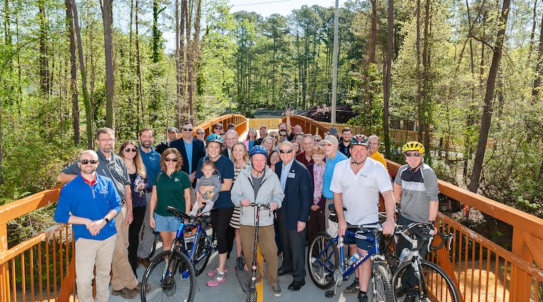 Dunwoody city officials recently cut the ribbon to officially open the new pedestrian bridge crossing Nancy Creek.