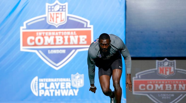 Kehinde Oginni of Nigeria participates in a drill at the NFL international scouting combine at Tottenham Hotspur Stadium in London, Tuesday, Oct. 12, 2021. (AP Photo/Steve Luciano)
