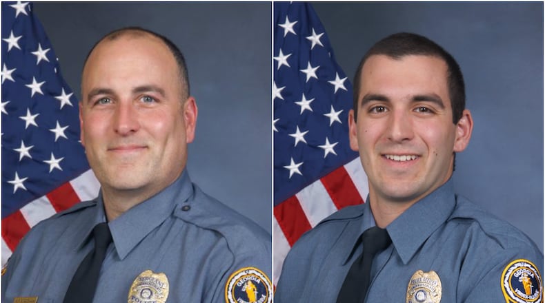 Now-former Gwinnett County police Sgt. Michael Bongiovanni and Master Police Officer Robert McDonald. (Credit: Gwinnett County Police Department)