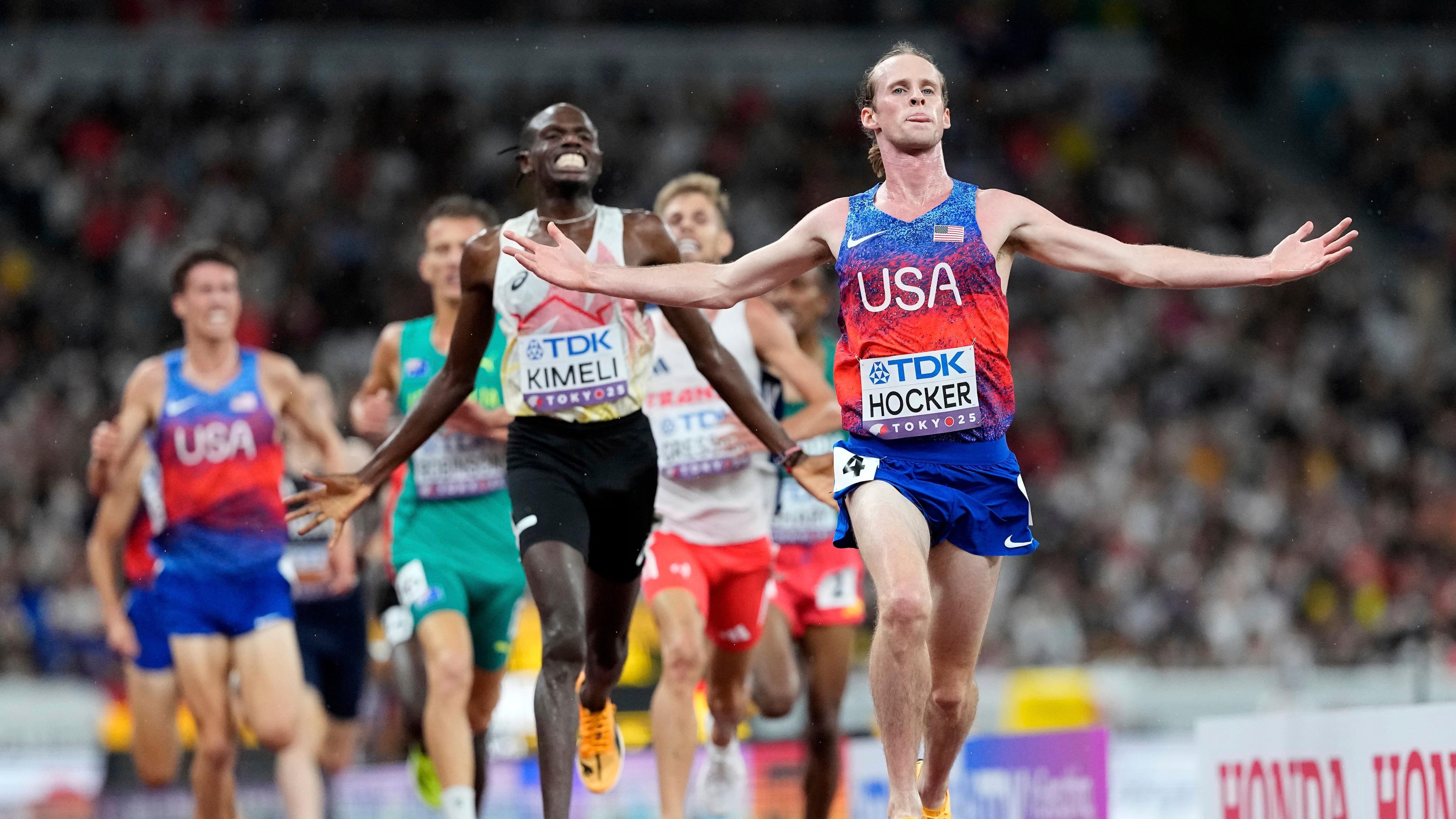 United States' Cole Hocker celebrates winning the gold in the men's 5,000 meters final at the World Athletics Championships in Tokyo, Sunday, Sept. 21, 2025. (AP Photo/Petr David Josek)
