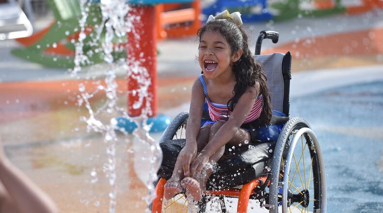 A girl plays at Morgan's Inspiration Island water park in San Antonio.