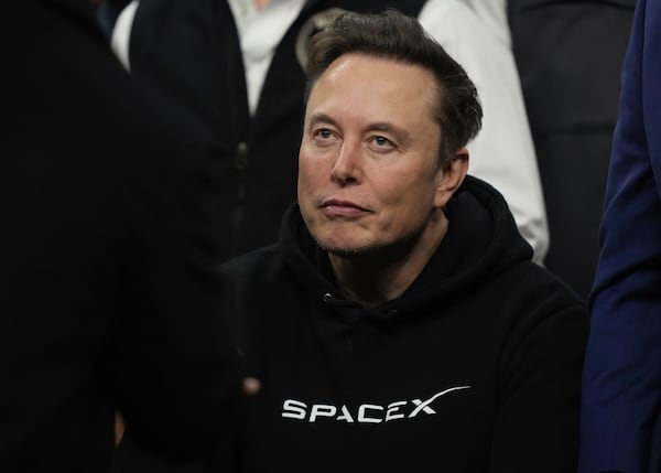 FILE - Elon Musk attends the finals for the NCAA wrestling championship, Saturday, March 22, 2025, in Philadelphia. (AP Photo/Matt Rourke, file)