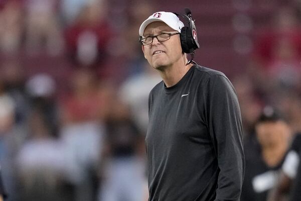 FILE - Stanford head coach Troy Taylor reacts as he watches the video board during the first half of an NCAA college football game against SMU in Stanford, Calif., Saturday, Oct. 19, 2024. (AP Photo/Jeff Chiu,File)