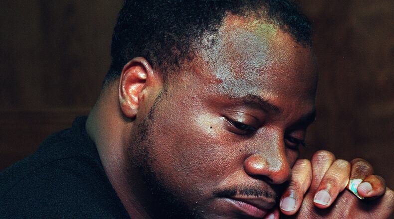 Bishop Eddie Long (cq) in deep thought in his New Birth office during a meeting in 1999. (Renee’ Hannans/Staff).