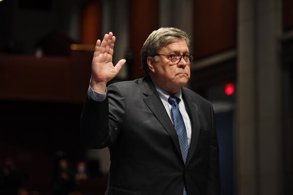 Attorney General William Barr is sworn in to testify before the House Judiciary Committee. (Matt McClain/Pool via The New York Times) 