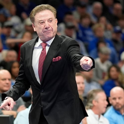 St. John's head coach Rick Pitino speaks during the first half of an NCAA basketball game against Kentucky, Saturday, Dec. 20, 2025, in Atlanta. (AP Photo/Mike Stewart)