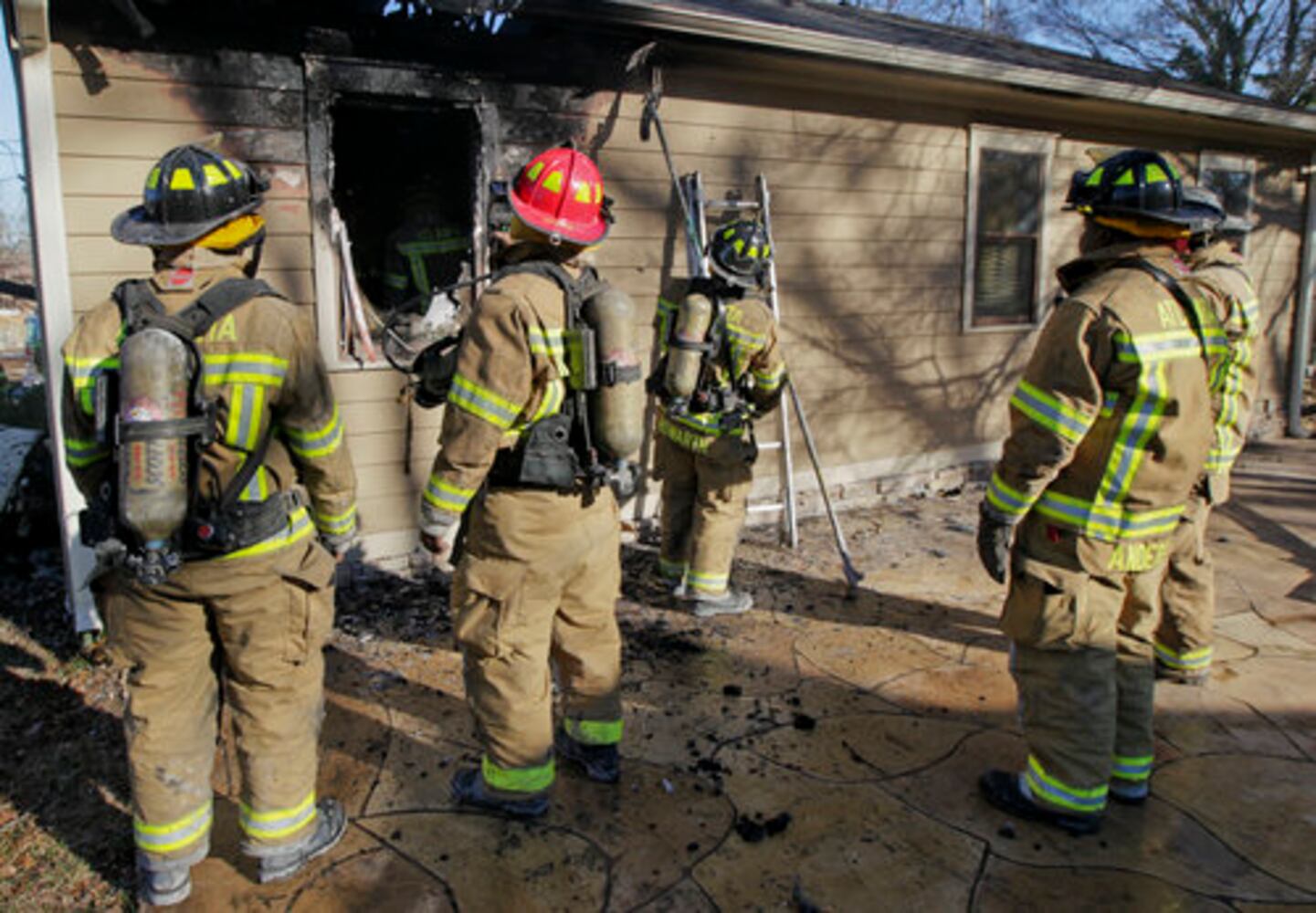 Firefighters battle Atlanta house fire
