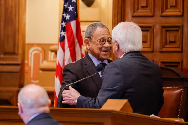 U.S. Rep. Sanford Bishop (left), D-Albany, is greeted by Speaker Jon Burns in the House of Representatives on Tuesday, Feb. 17, 2026, in Atlanta. (Arvin Temkar/AJC)
