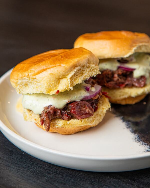 Dhaba BBQ’s oxtail tikka masala sandos. (Aaliyah Mann for The Atlanta Journal-Constitution)