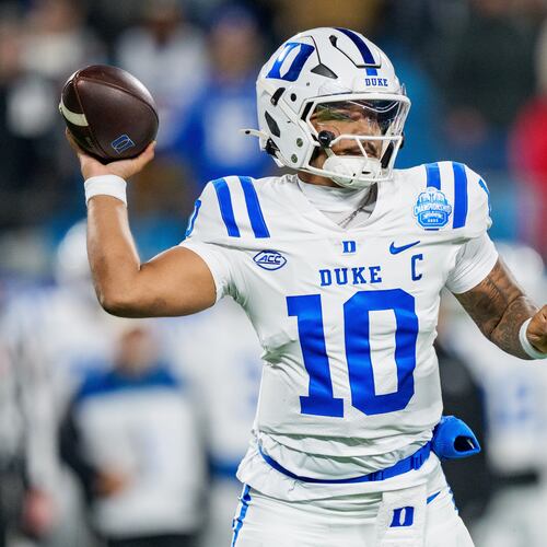 FILE - Duke quarterback Darian Mensah looks to pass the ball against Virginia in the first half of the Atlantic Coast Conference championship NCAA college football game in Charlotte, N.C., Dec. 6, 2025. (AP Photo/Jacob Kupferman)